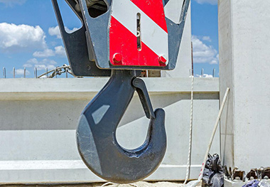 Why does the hook of the electric hoist wear out?